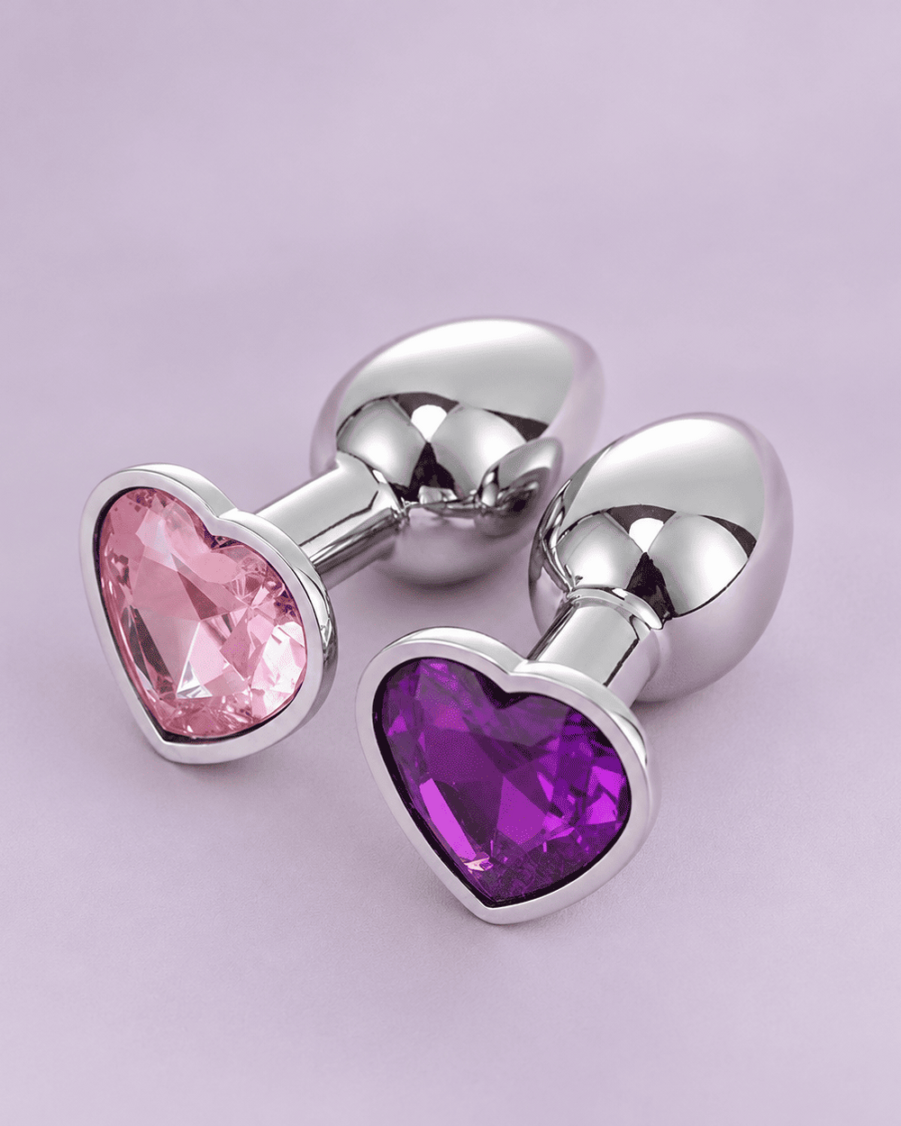 Plugs de corazón color rosa y morado